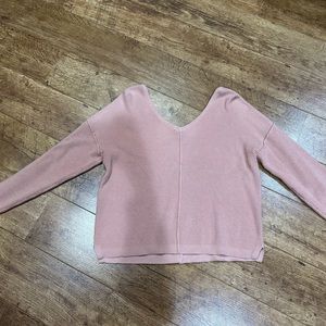 Pink sweater with button up back